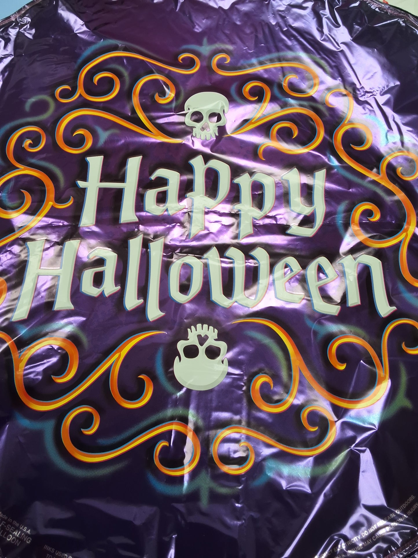 18" Happy Halloween purple w/skulls Mylar Balloon